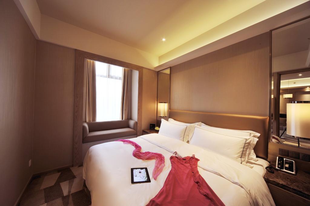Royal Suites & Towers Wuhan Zimmer foto